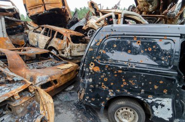Car cemetery. Storage of burned cars near Kyiv, Ukraine