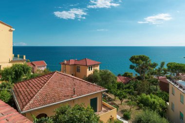 Sunny mediterranian town with deep blue sky and sea on the background. Imperia, Italy, Europe. Perfect destination for summer vacation