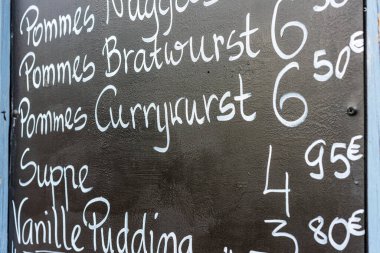 Price board for fast food at a snack bar in Berlin, Germany