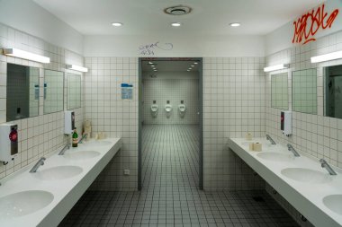 public men's toilet in an administration building, berlin, germany