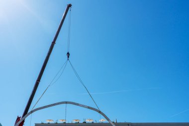 Craftsmen dismantling an event stage on Bebelplatz, Berlin-Mitte, Germany