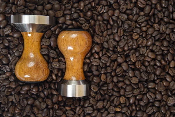 Coffee and tamper background — Stock Photo, Image