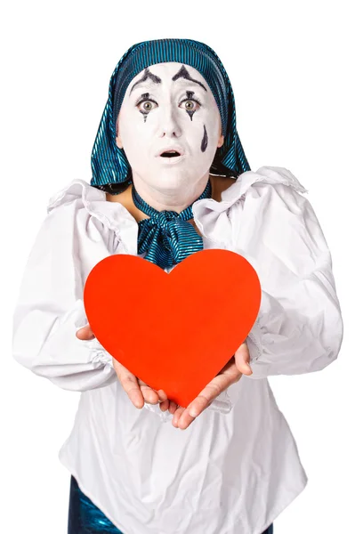 Sad female mime clown with a red heart — Stock Photo, Image