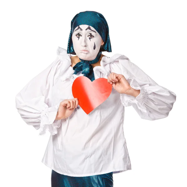 A sad female mime clown with a red heart — Stock Photo, Image