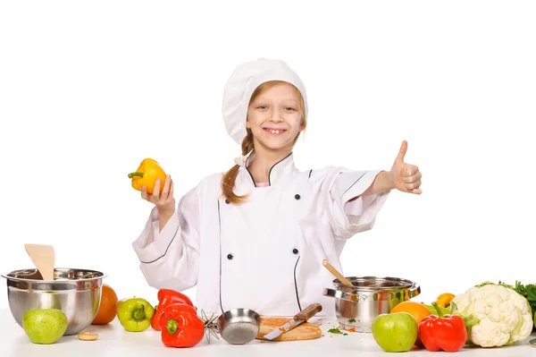 Happy little chef with lots of vegetables — Stock Photo, Image