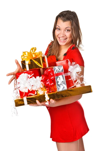 Szép lány piros ruha gazdaság mögött a karácsony bemutat — Stock Fotó