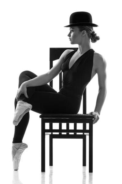 Ballet dancer girl sitting on the chair — Stock Photo, Image