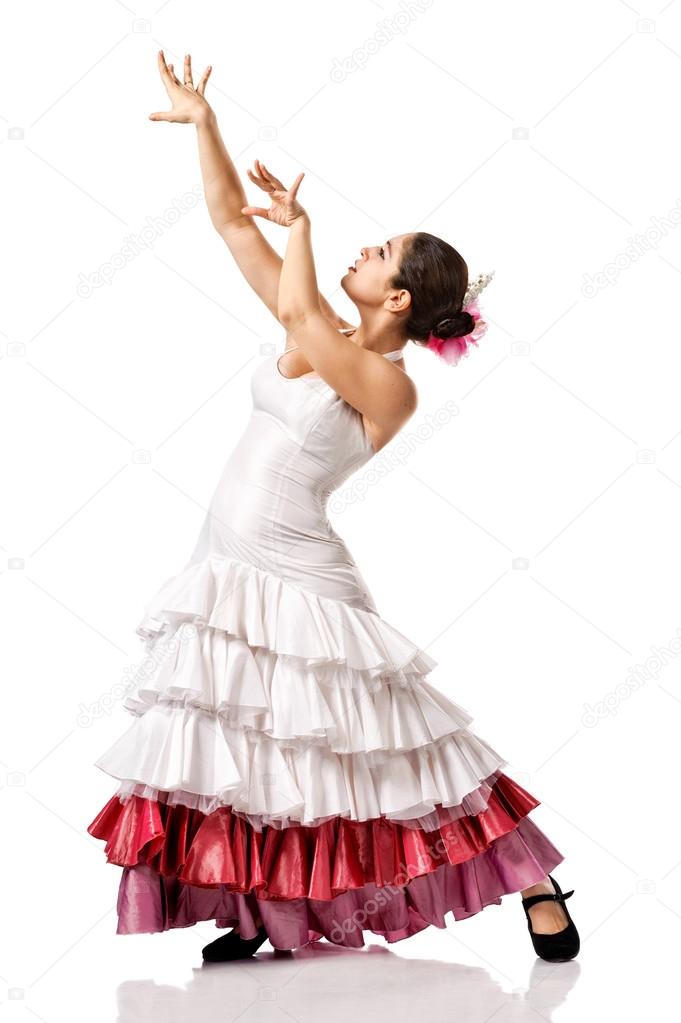 Portrait of beautiful young woman dancing flamenco