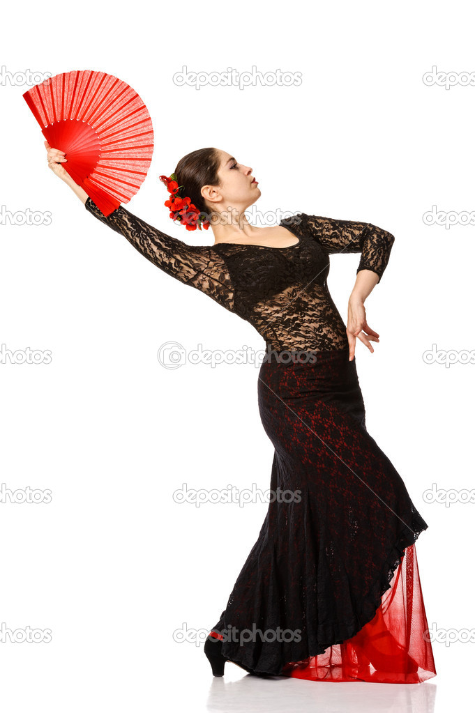 Portrait of beautiful young woman dancing flamenco