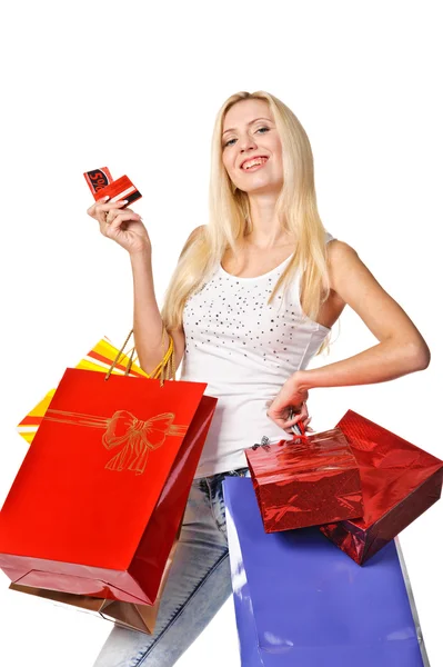 Retrato de mulher jovem carregando sacos de compras — Fotografia de Stock