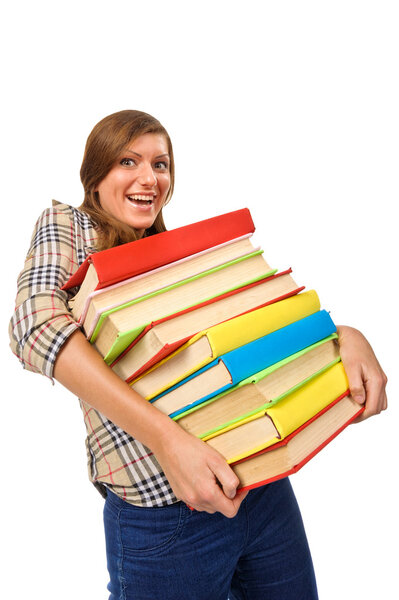 Девочка-подросток борется со стопкой книг
