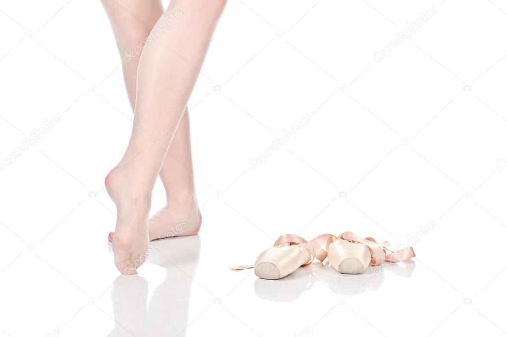 Beauty legs of ballerina standing on tiptoes. pointes.