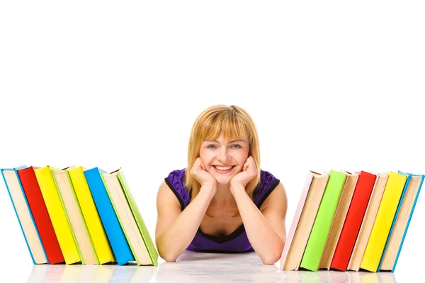 Young woman with books on floor — Stock Photo, Image