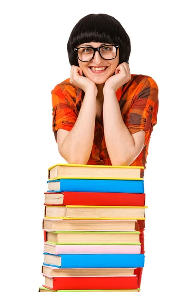 Chica con pila libro mostrando el pulgar hacia arriba . Fotos de stock