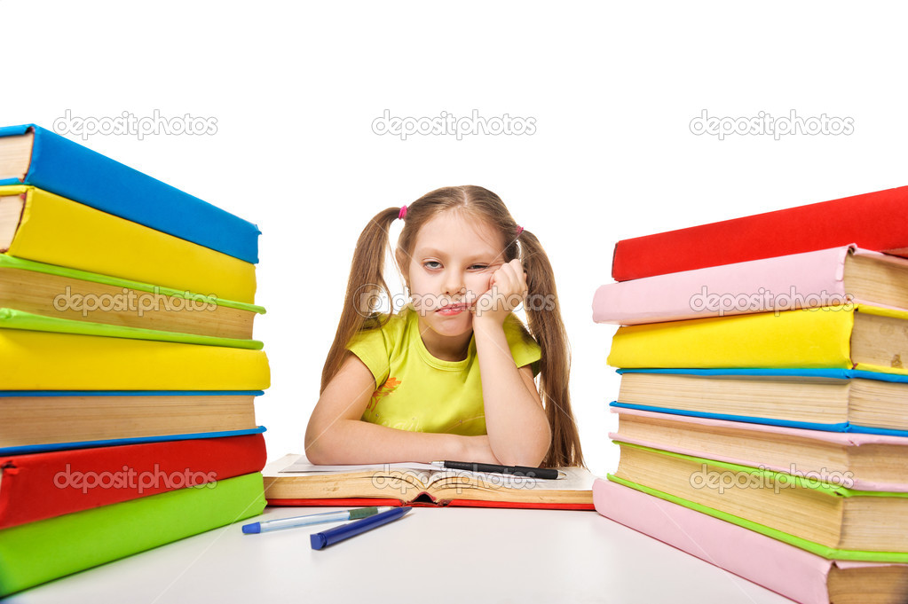 Bored schoolgirl with pile of books. homework