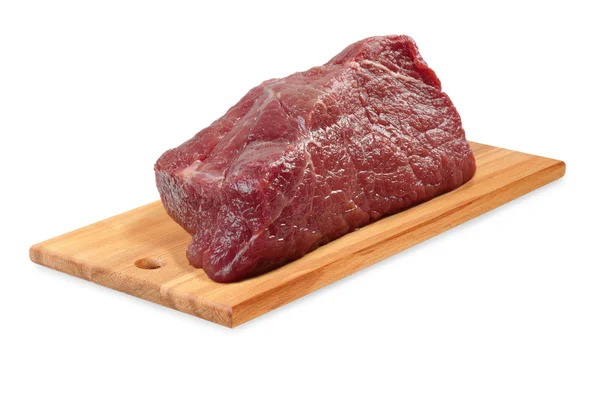 Carne di manzo su una tavola di legno — Foto Stock