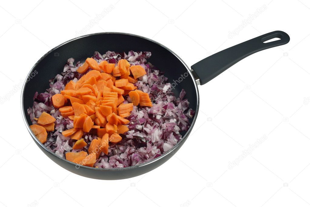 Onions and carrots in pan