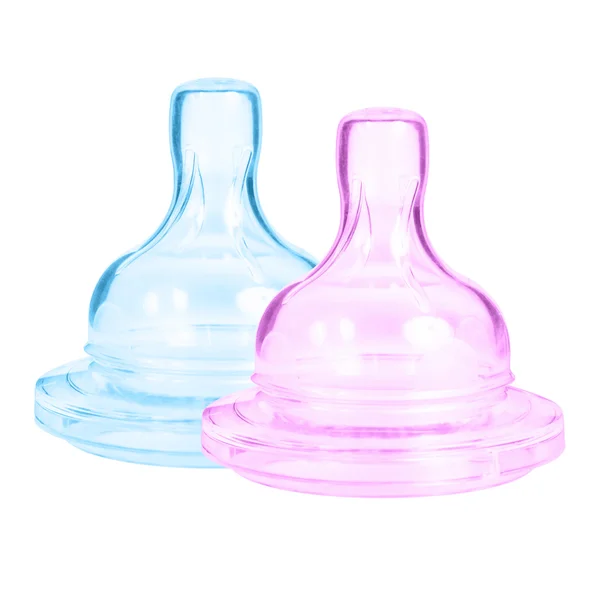 Детские бутылки розового и голубого цвета — стоковое фото