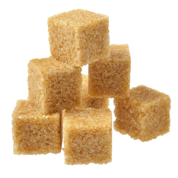 Barna cukor, egy pár darab. Stock Kép