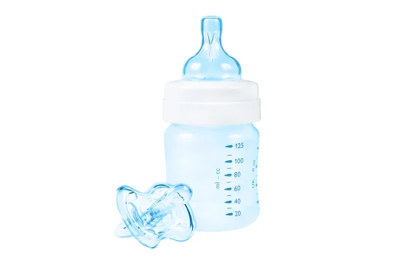 Baby bottle and pacifier Stock Image
