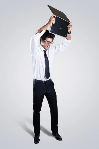 Executive angry with his laptop — Stock Photo, Image