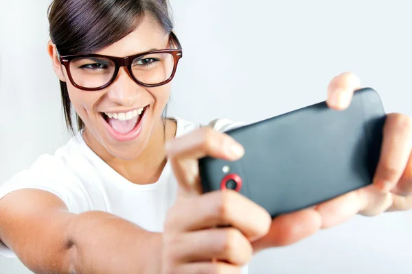 Cute brunette woman taking photo of herself — Stock Photo, Image