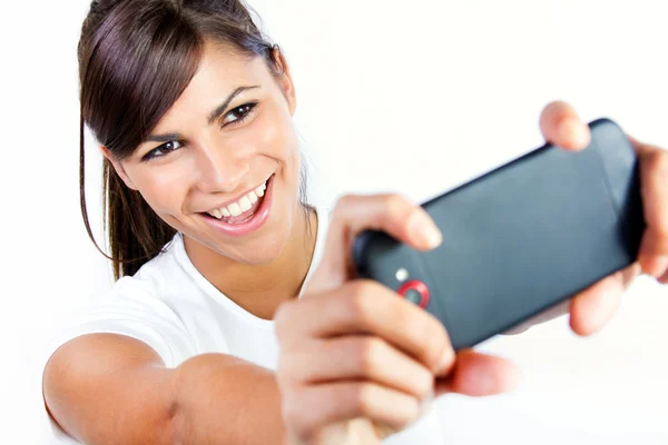 Cute brunette woman taking photo of herself — Stock Photo, Image