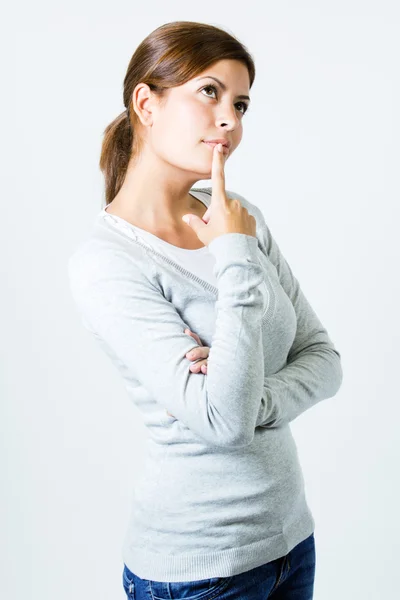 Beautiful young woman thinking — Stock Photo, Image