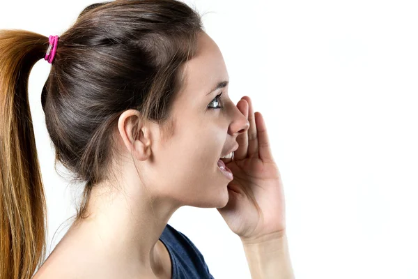 Young blonde woman whispering gossip — Stock Photo, Image