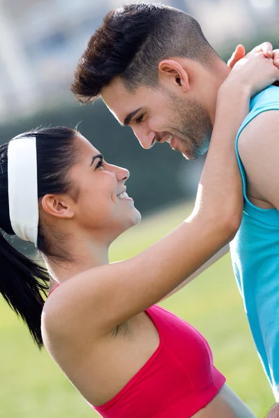 Young couple in the park after exercise — Stock Photo, Image