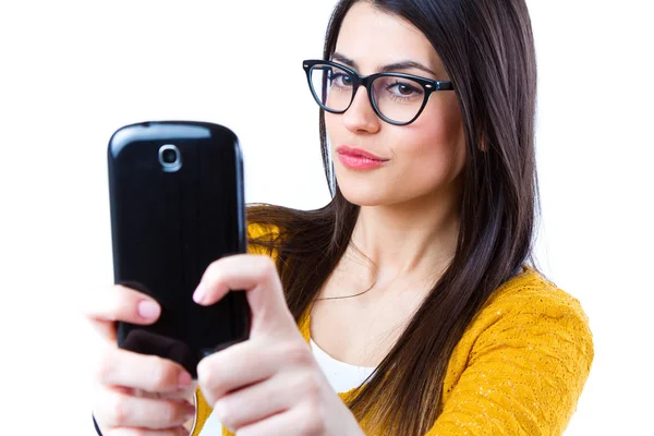 Cute brunette woman taking photo of herself — Stock Photo, Image