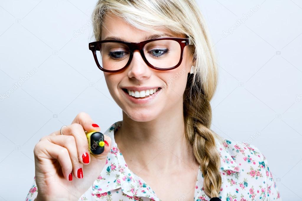 Pretty young teacher woman writing on the screen