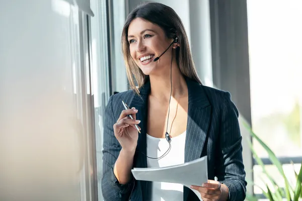 Shot Elegant Business Woman Talking Earphone While Checking Some Documents — Stock Photo, Image