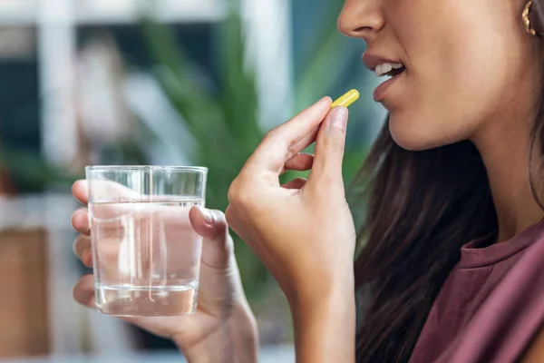 Close Young Woman Taking Pills While Holding Glass Water Sitting — Stock Photo, Image