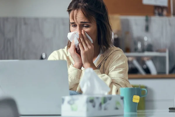 Shot Illness Young Woman Sneezing Tissue While Working Laptop Sitting — Stock Photo, Image