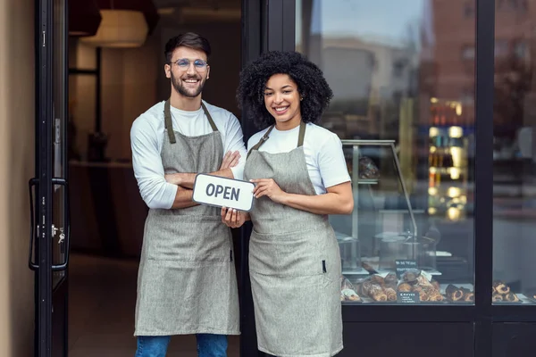 Portrait Two Owners Friends Holding Open Sign Together While Smiling —  Fotos de Stock