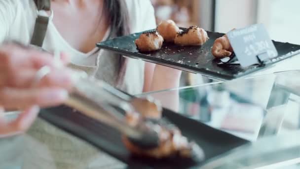 Video Close Hands Pastry Woman Grabbing Tray Chocolate Croissants Serve — Stok Video