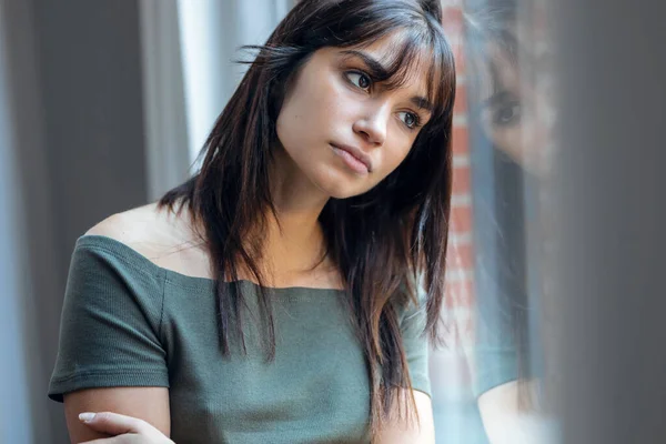 Portrait Beautiful Young Woman Thinking Looking Out Window While Standing — Stock Photo, Image