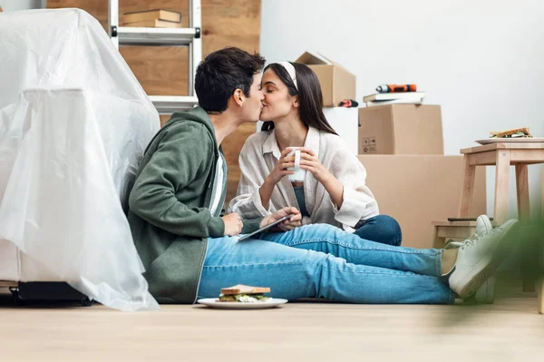 Shot Cute Couple Using Tablet While Relaxing Moving New House — Stockfoto