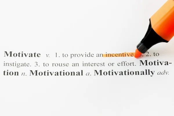 Motivate with an Orange Highlight Marker Pen — Stock Photo, Image