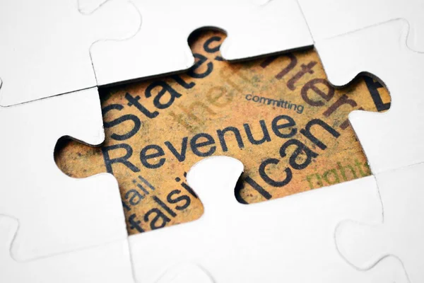 Revenue puzzle concept — Stock Photo, Image