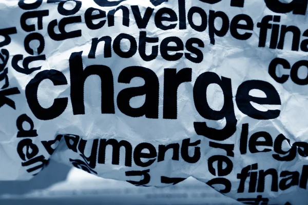 Charge text on crinkled paper — Stock Photo, Image