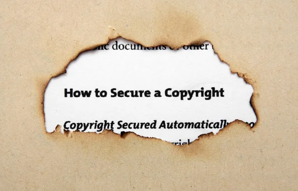 Copyright on paper hole — Stock Photo, Image