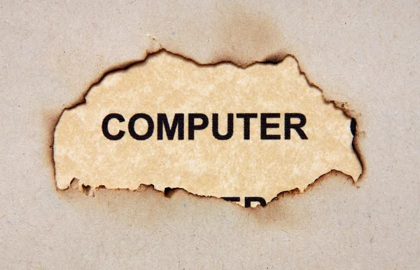 Computer text on paper hole — Stock Photo, Image