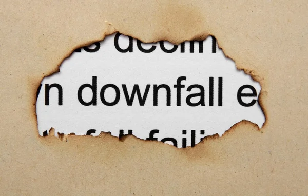 Downfall text on paper hole — Stock Photo, Image