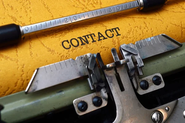 Contact on typewriter — Stock Photo, Image