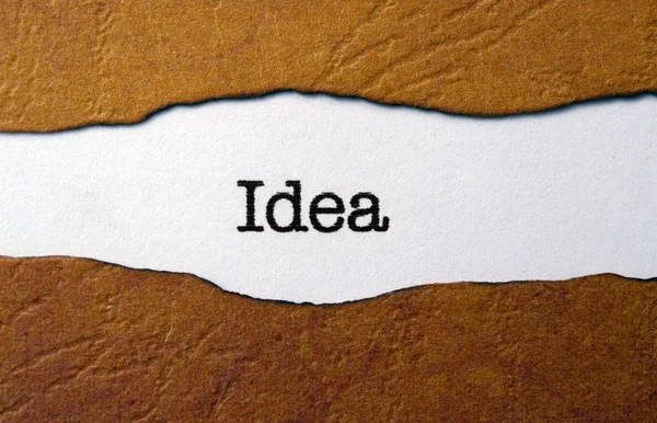 Idea text on torn paper — Stock Photo, Image