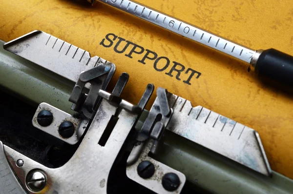 Unterstützung auf der Schreibmaschine — Stockfoto