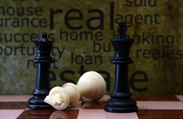 Conceito de xadrez e imóveis — Fotografia de Stock