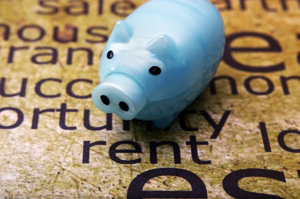 Piggy bank en huur concept — Stockfoto